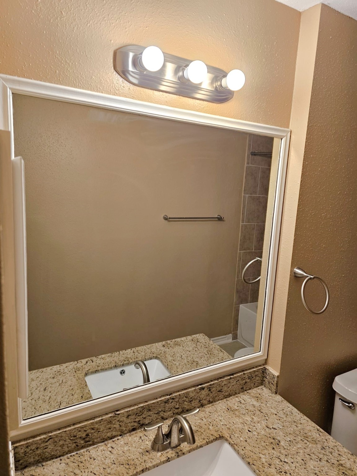 2327 Shadbury Court Houston, TX 77339 - Photo 23 of 32 a bathroom with a sink a toilet and shower
