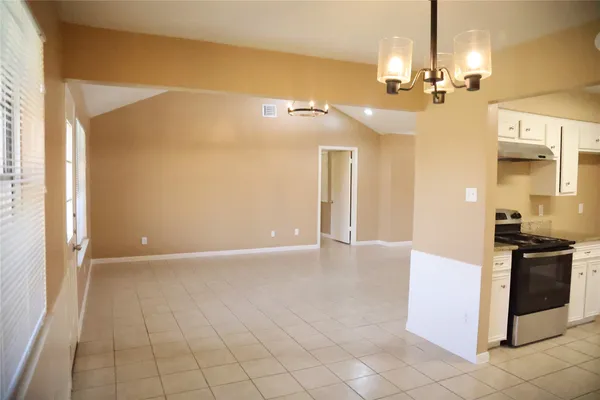a view of a livingroom with a furniture