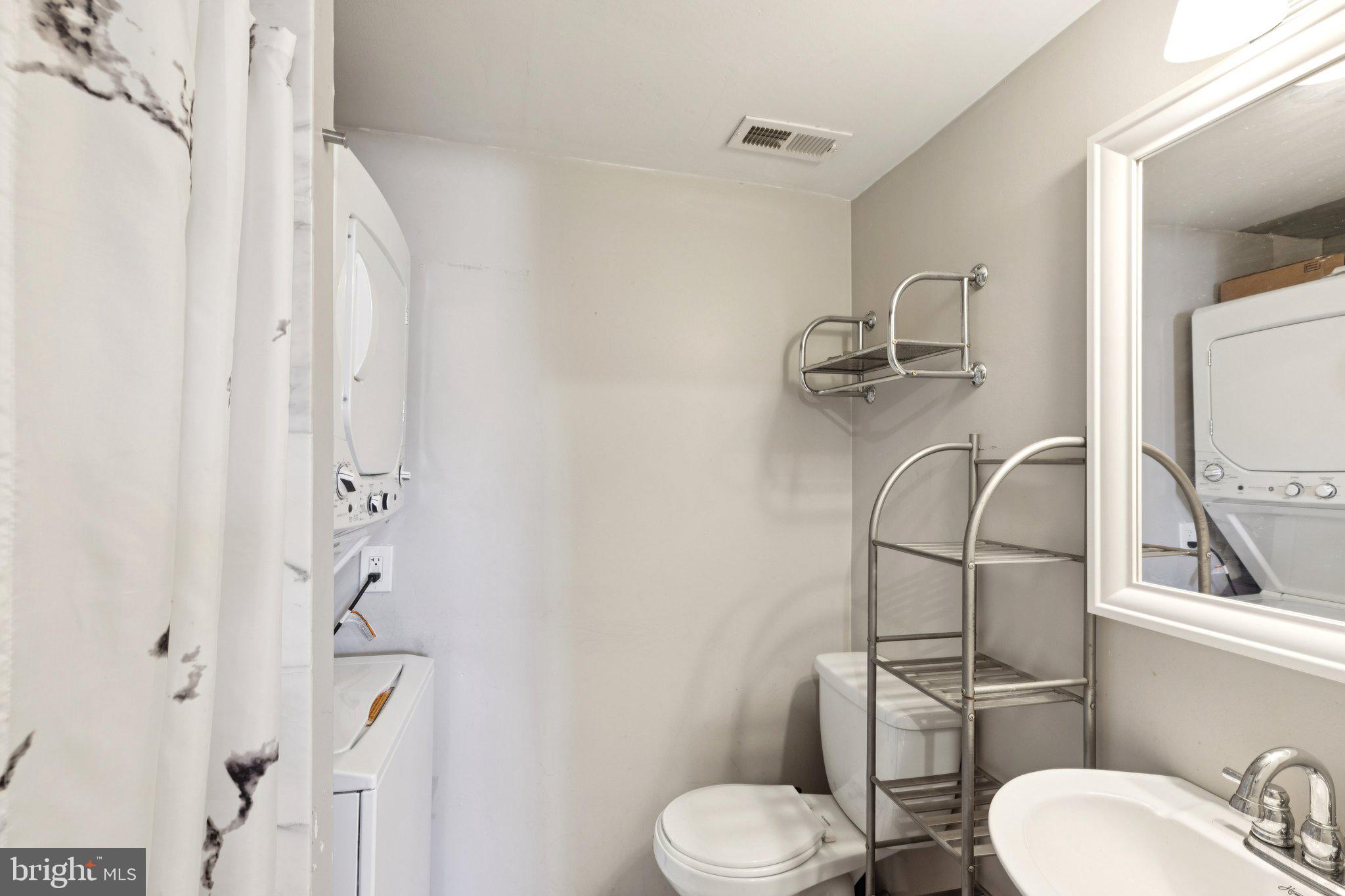 618 South 21st Street Philadelphia, PA 19146 - Photo 11 of 16 a white toilet sitting next to a bathroom sink