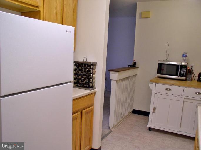 2207 Greenery Lane, Unit T2 Silver Spring, MD 20906 - Photo 8 of 27 New Kitchen Floor