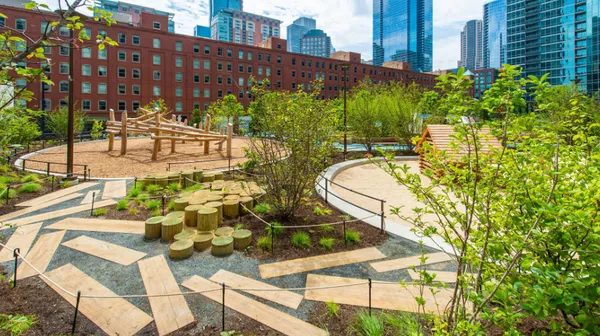 front view of a building with a swimming pool