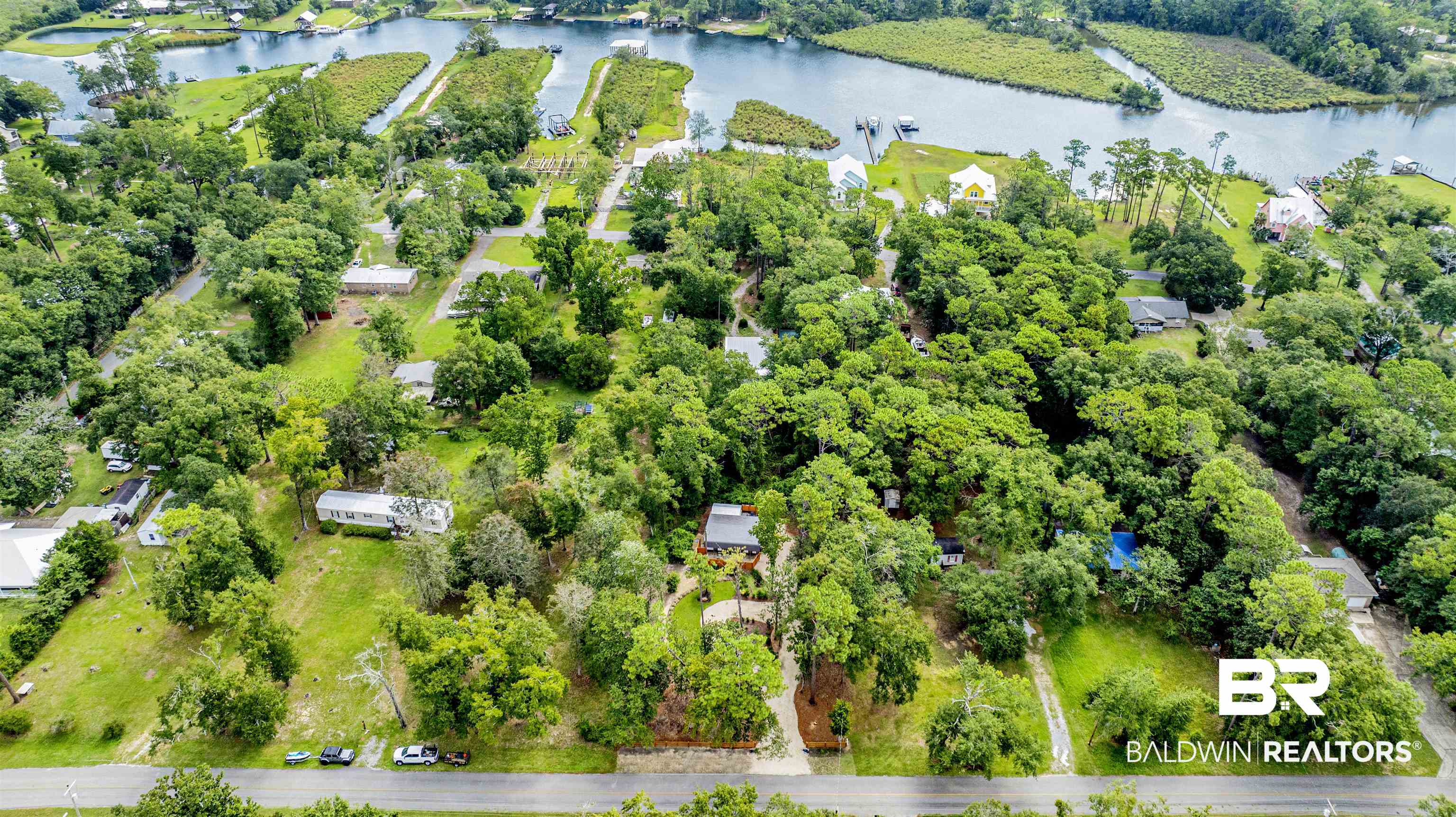 6874 Cook Road Foley, AL 36535 - Photo 16 of 24 Birds eye view of property featuring a water view