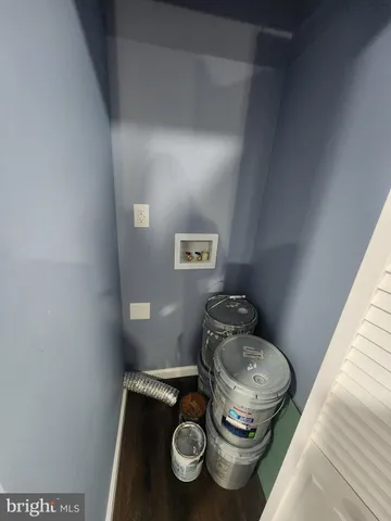 a bathroom with a toilet and a sink