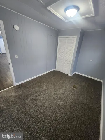 en empty room with windows