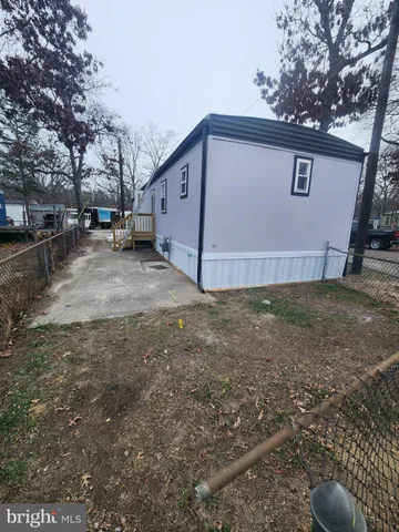 a view of a backyard of the house