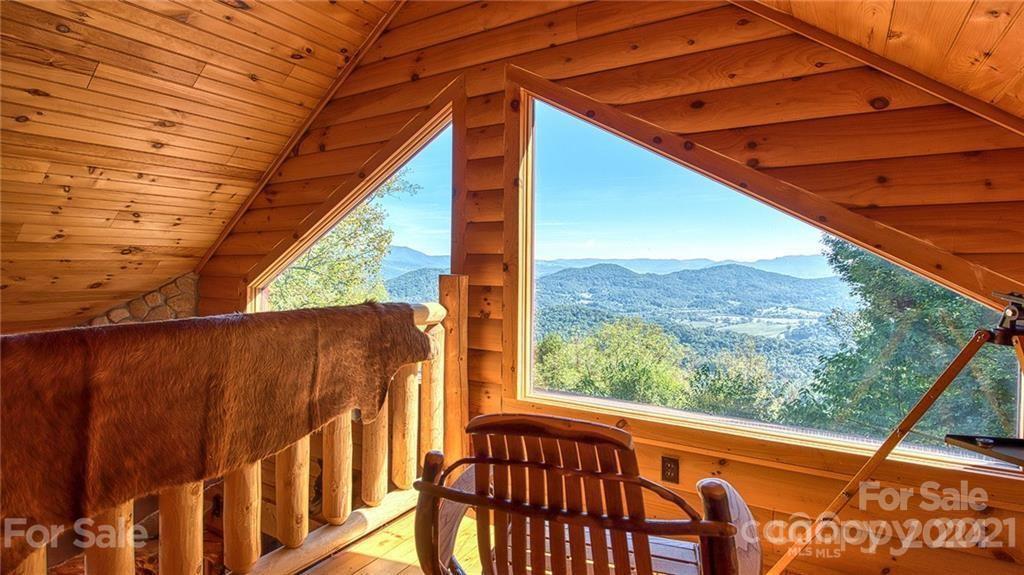 135 Aerial Ridge Waynesville, NC 28785 - Photo 15 of 27 a view of a blue and white umbrella