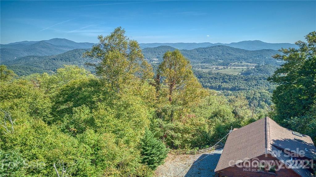 135 Aerial Ridge Waynesville, NC 28785 - Photo 2 of 27 a view of a yard