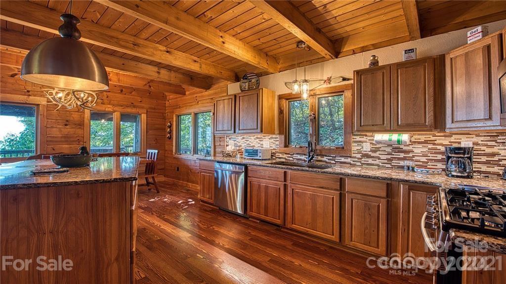 135 Aerial Ridge Waynesville, NC 28785 - Photo 6 of 27 a kitchen with lots of counter top space