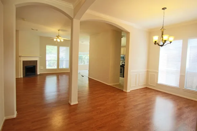 a view of a livingroom with wooden floor