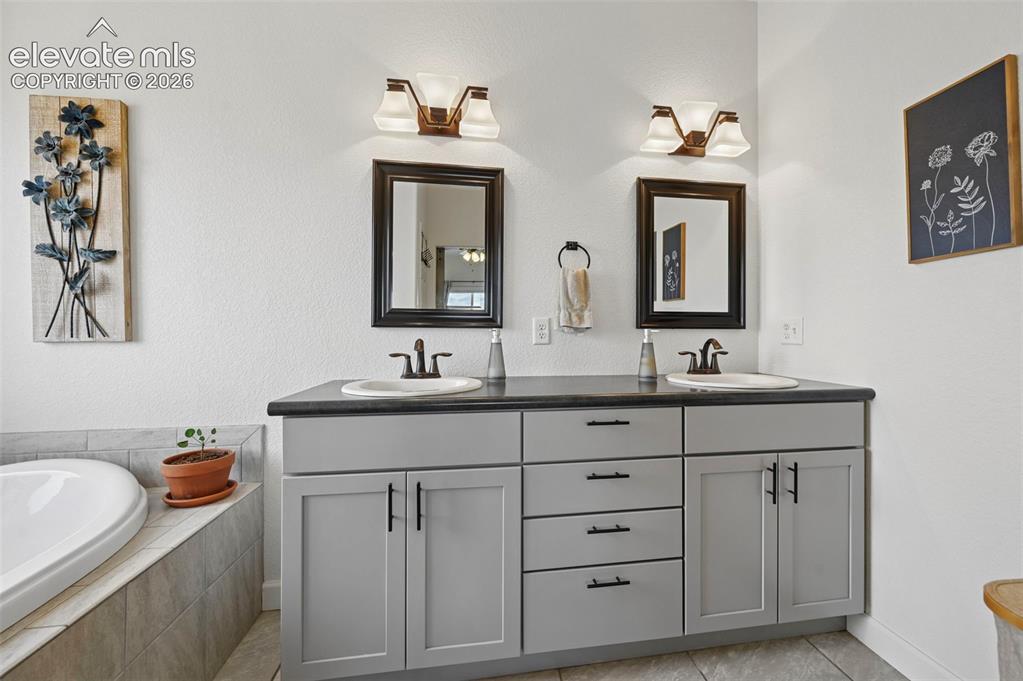 40051 Cold Iron Road Rush, CO 80833 - Photo 24 of 50 Primary Bathroom with dual vanity