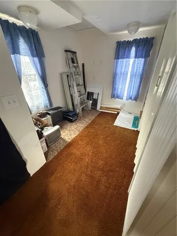a bathroom with a mirror and a sink