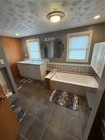 a bathroom with a sink and a shower