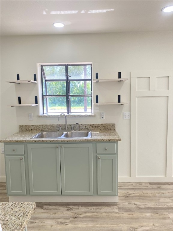 101 North Julian Street, Unit 1 San Diego, TX 78384 - Photo 2 of 12 a kitchen with stainless steel appliances granite countertop a sink and a cabinets