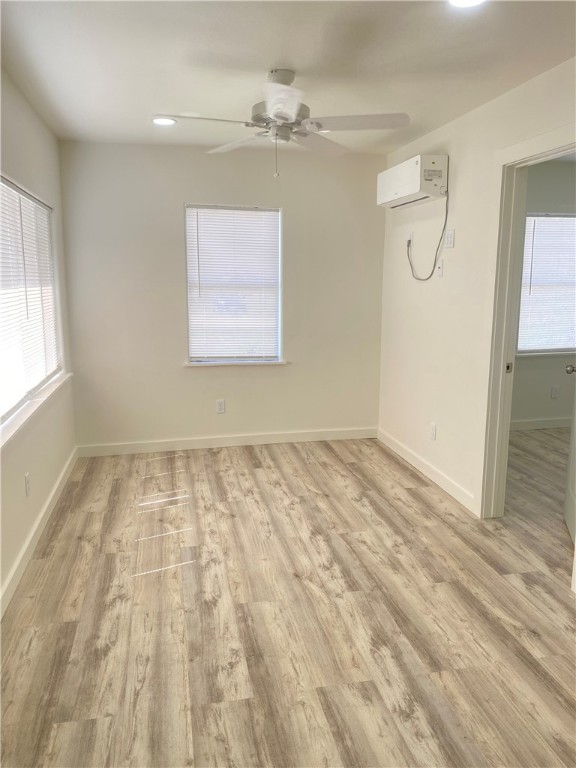 101 North Julian Street, Unit 1 San Diego, TX 78384 - Photo 5 of 12 a view of a room with wooden floor and windows