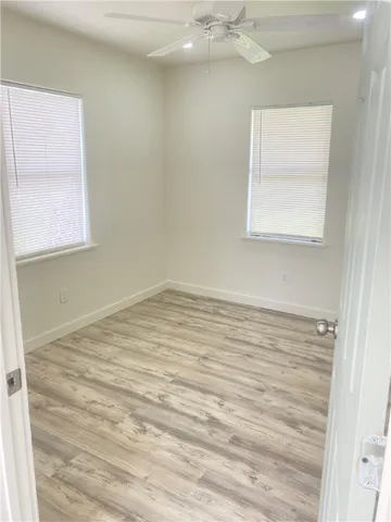 a view of a room that has a window in it