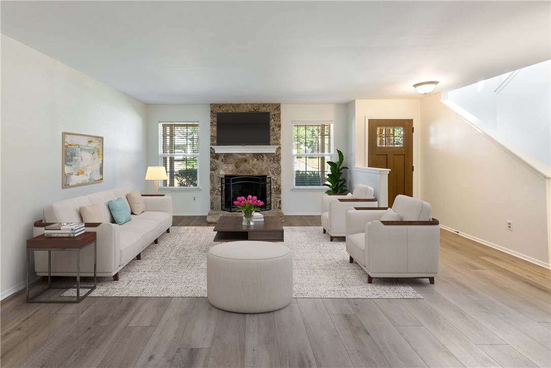 12702 Rhea Court Austin, TX 78727 - Photo 5 of 19 Cozy gas Fireplace in Family Room