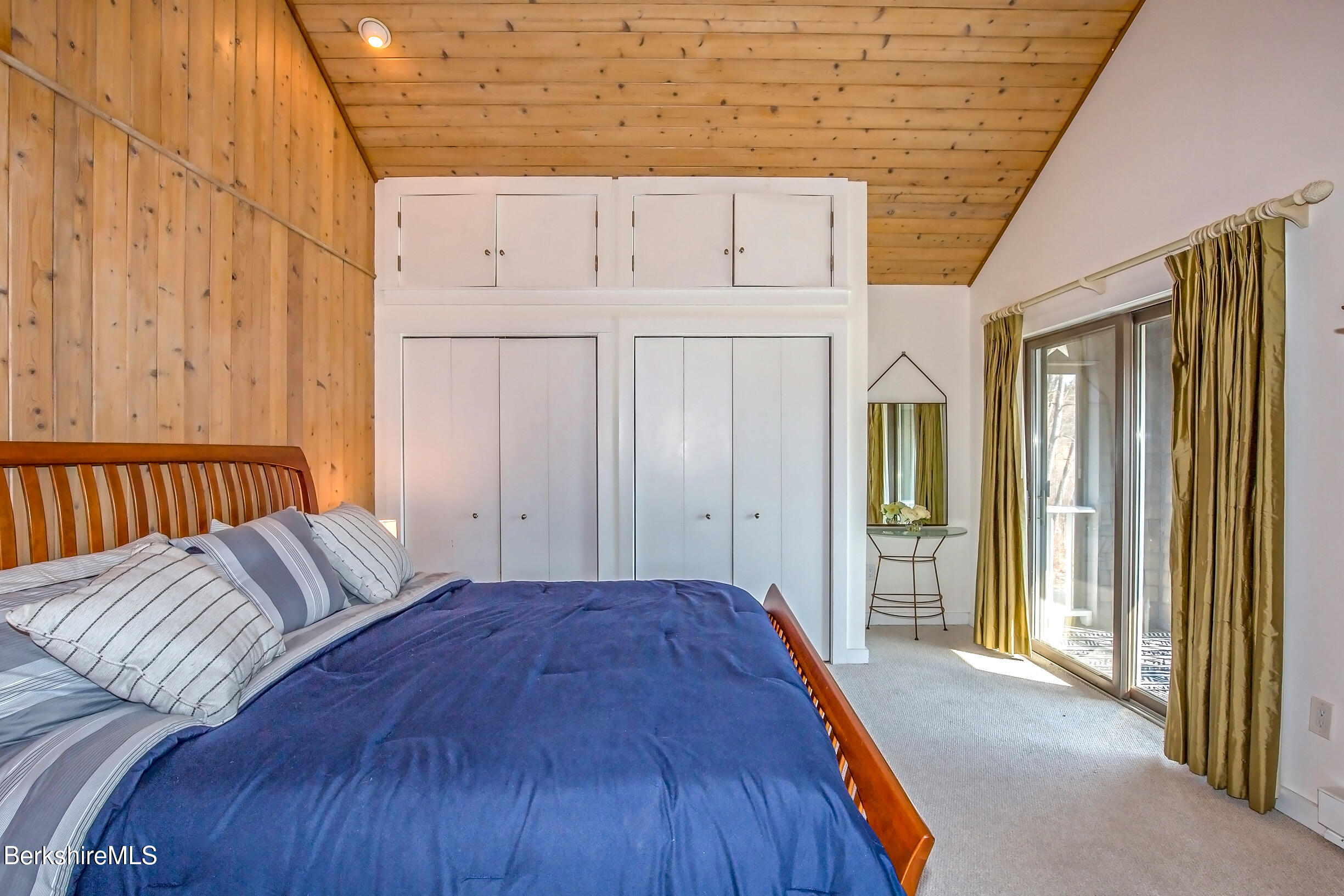 2 Wallace Road, Unit 2E Stockbridge, MA 01262 - Photo 18 of 50 a view of a bedroom with wooden floor and cabinet