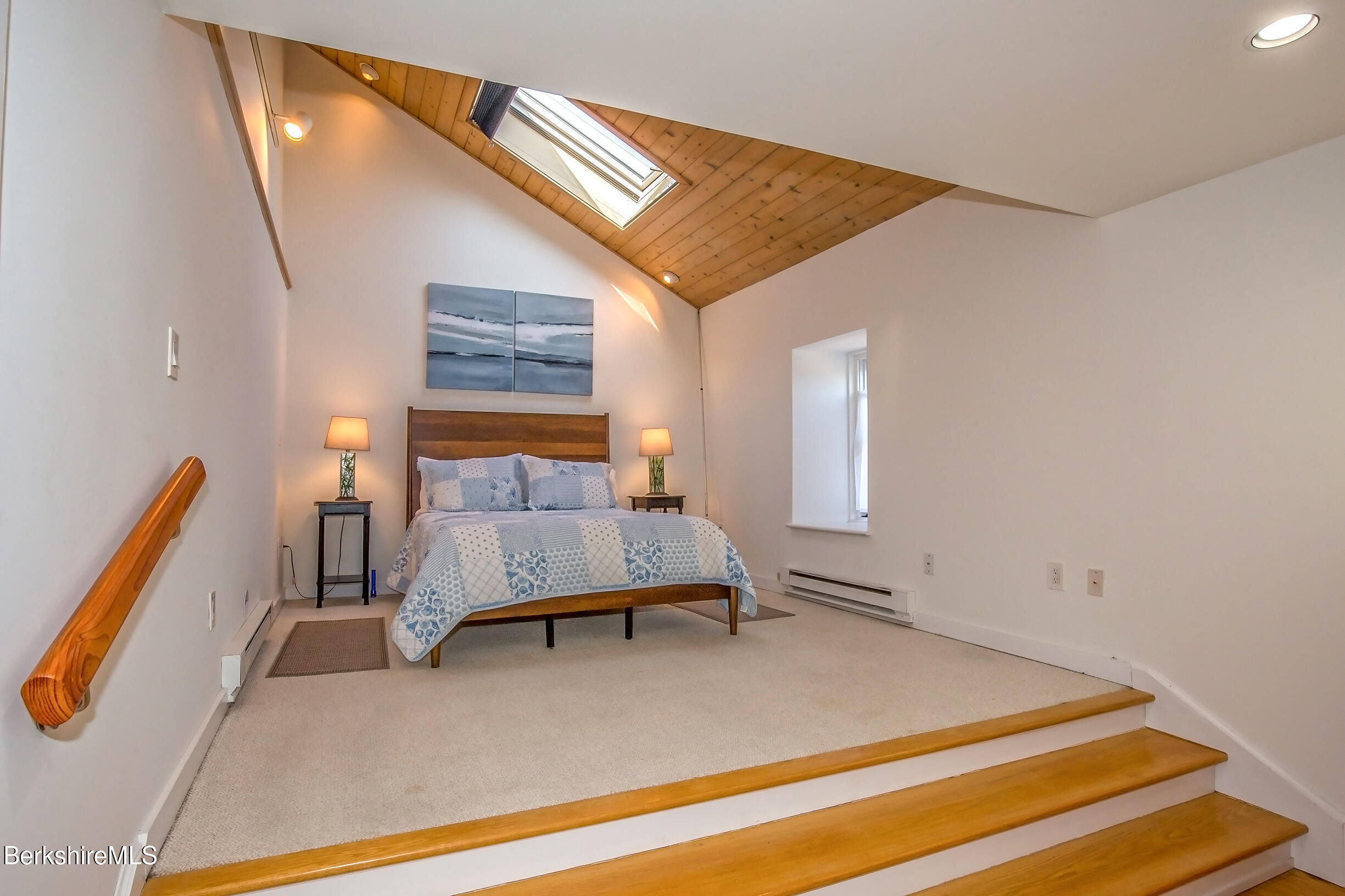 2 Wallace Road, Unit 2E Stockbridge, MA 01262 - Photo 24 of 50 a bedroom with a bed and window