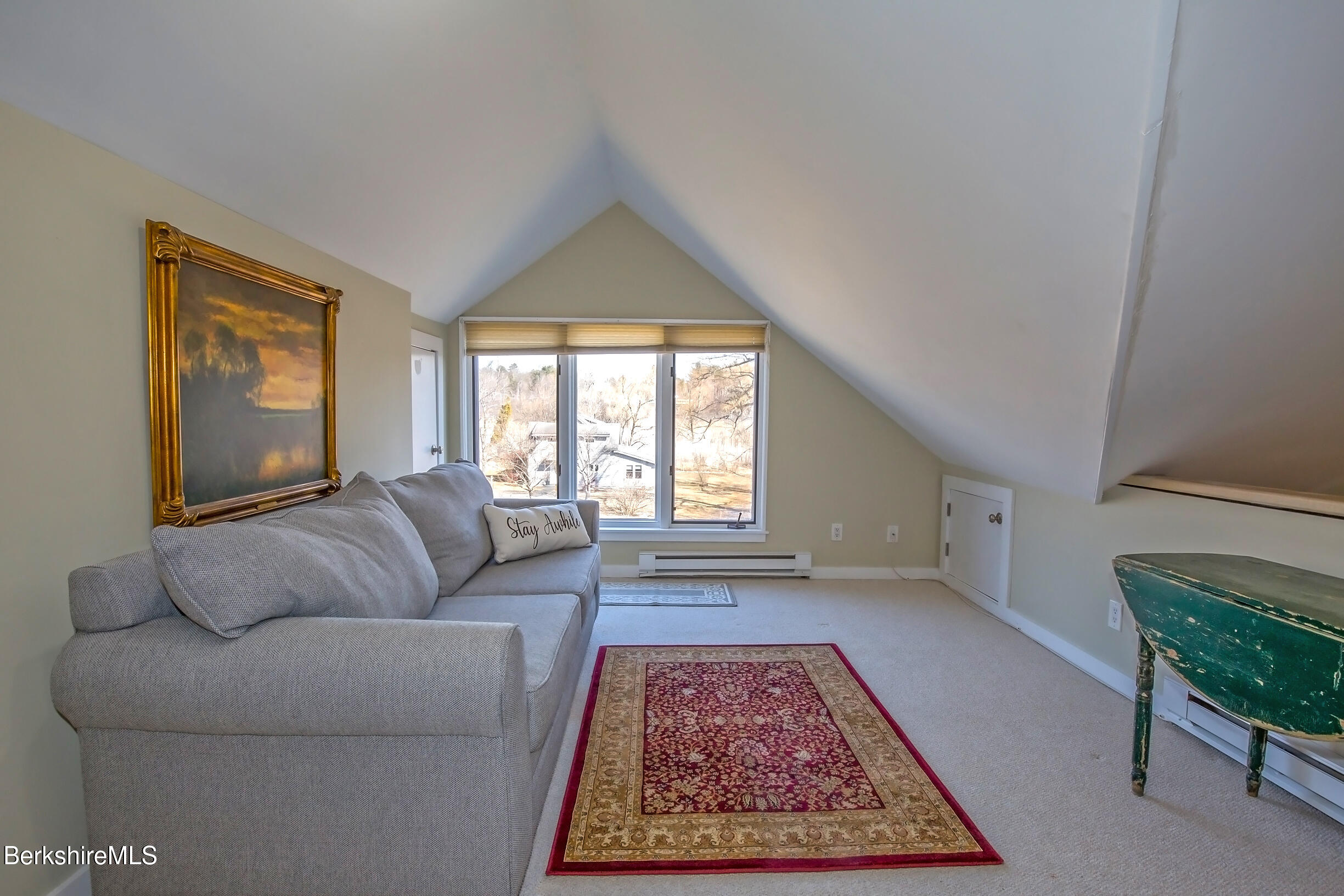 2 Wallace Road, Unit 2E Stockbridge, MA 01262 - Photo 29 of 50 a living room with furniture and a large window