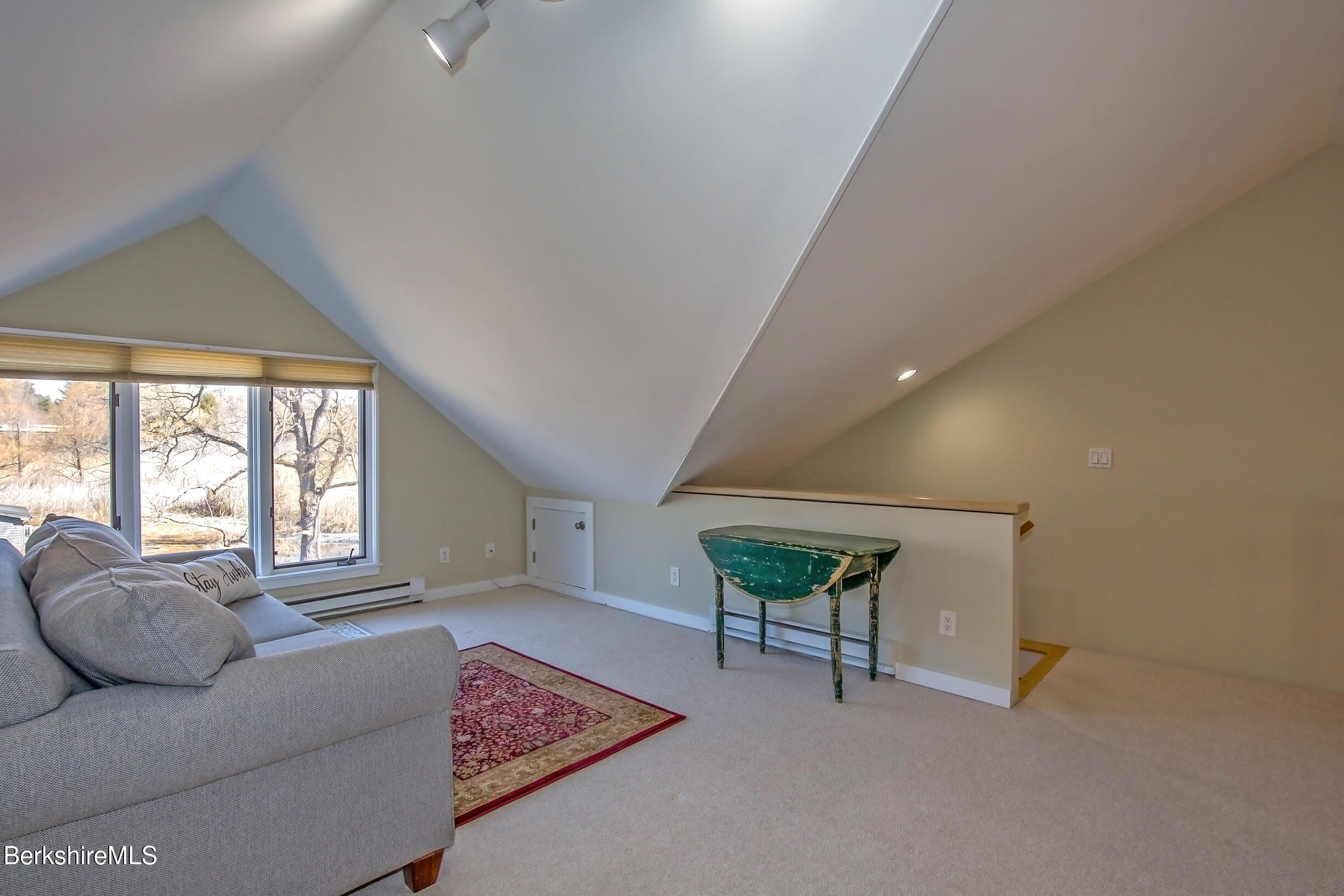 2 Wallace Road, Unit 2E Stockbridge, MA 01262 - Photo 30 of 50 a living room with furniture and a window