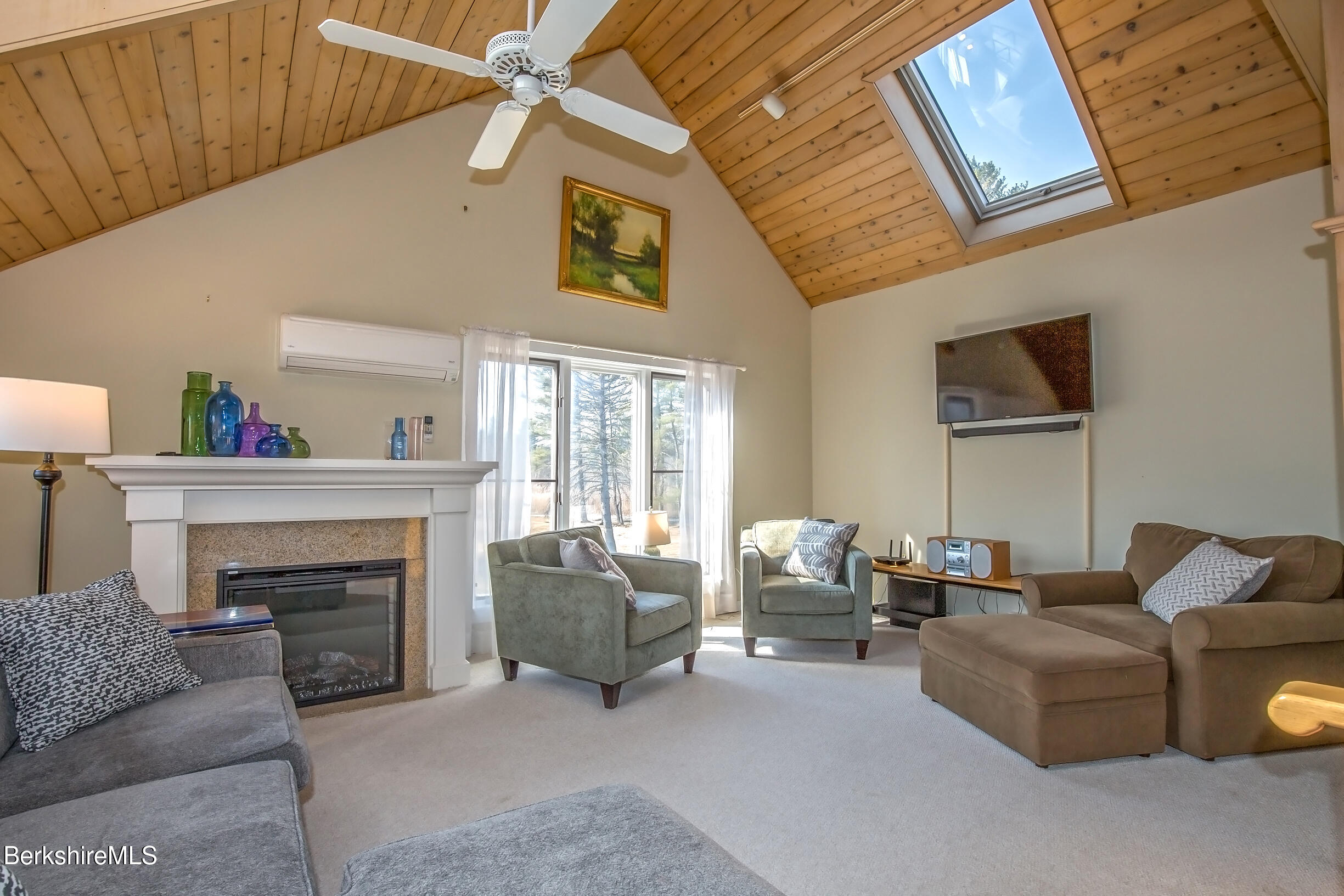 2 Wallace Road, Unit 2E Stockbridge, MA 01262 - Photo 3 of 50 a living room with furniture and a fireplace