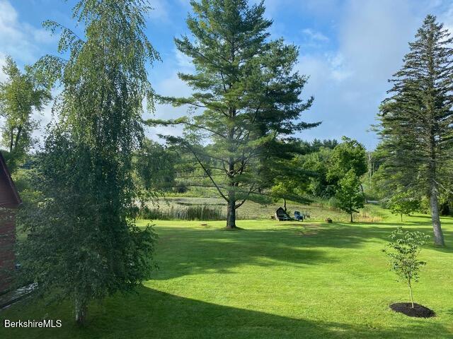2 Wallace Road, Unit 2E Stockbridge, MA 01262 - Photo 47 of 50 a view of grassy area with lots of trees