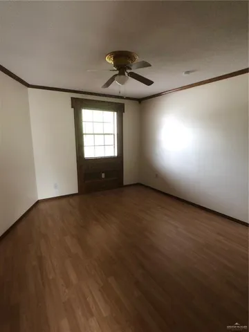 a view of a storage & utility room with a sink