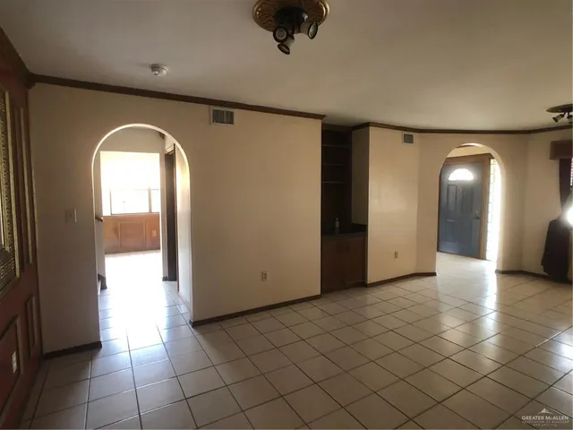 a kitchen with a cabinets and steel appliances