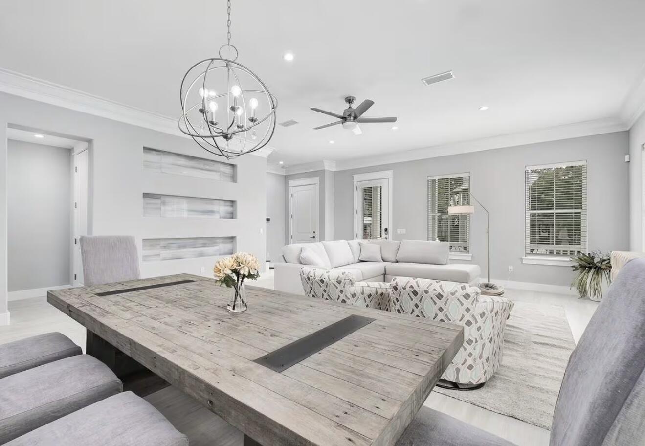 37 Grande Pointe Drive Inlet Beach, FL 32461 - Photo 13 of 58 a living room with furniture or couch and a chandelier