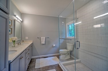 21 North Road Jamestown, RI 02835 - Photo 34 of 38 Owner en Suite bath has double sinks, storage, and a beautiful shower.