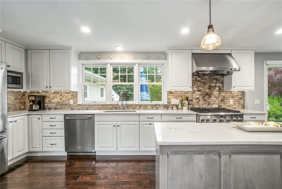 21 North Road Jamestown, RI 02835 - Photo 5 of 38 Beautiful natural light, with Andersen windows and slider, make cooking in this space a delight!