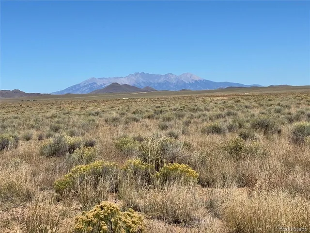 a view of an outdoor space and mountain view
