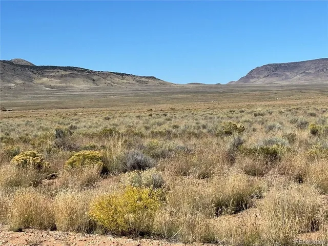 a view of ocean view with mountains in the background