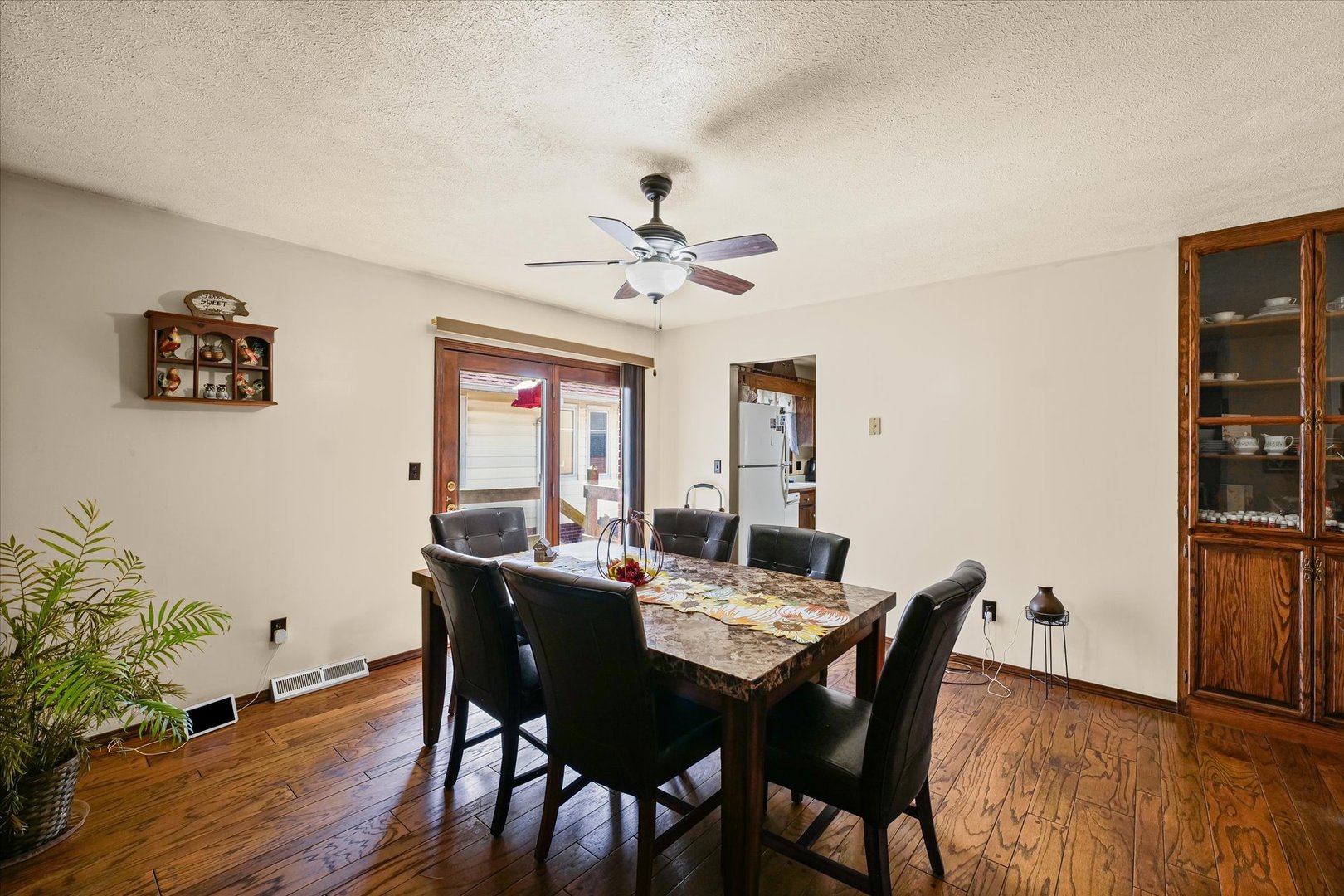 120 North Fredrick Street Rantoul, IL 61866 - Photo 13 of 46 a view of a dining room with furniture window and wooden floor