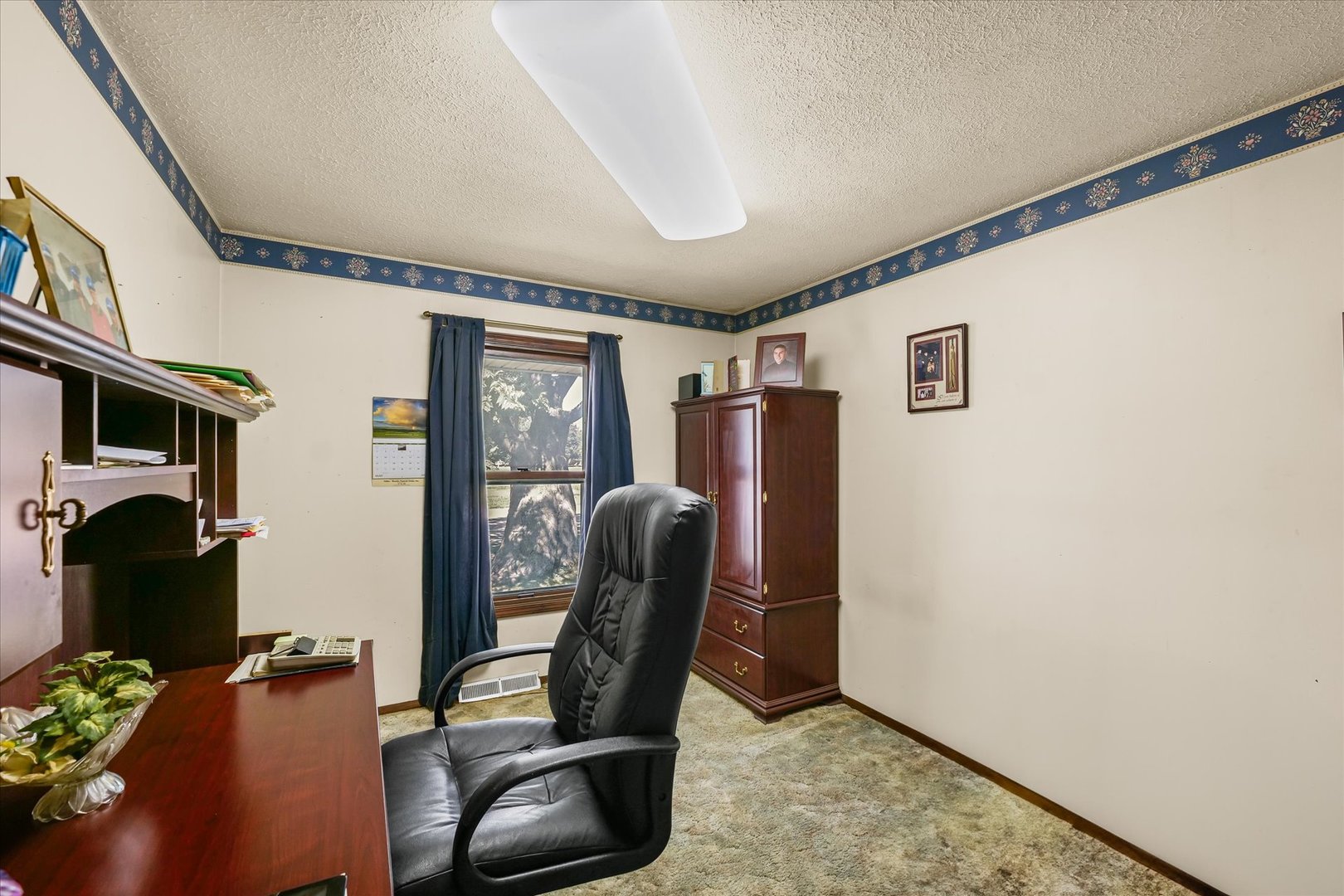 120 North Fredrick Street Rantoul, IL 61866 - Photo 22 of 46 a view of workspace with furniture and natural light