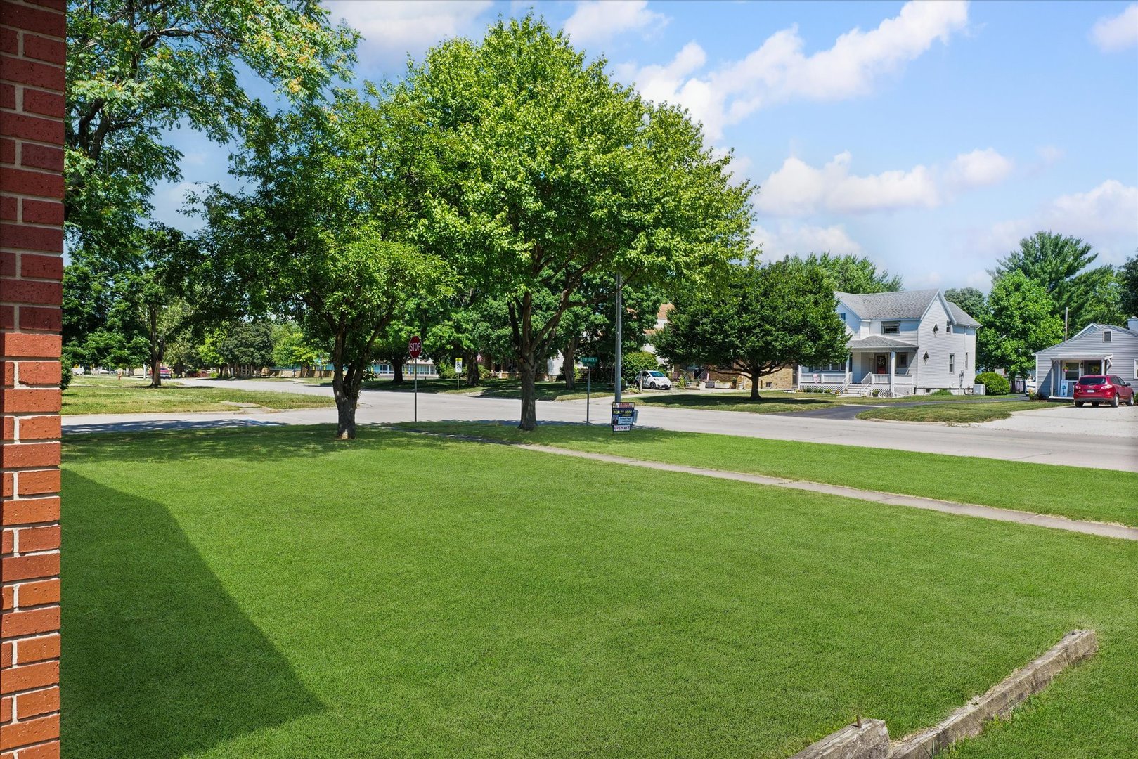 120 North Fredrick Street Rantoul, IL 61866 - Photo 42 of 46 a huge green field with lots of trees