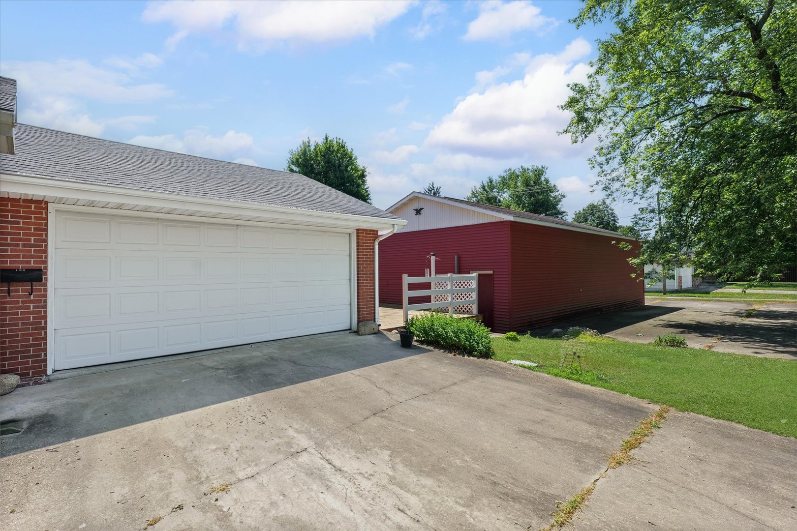 120 North Fredrick Street Rantoul, IL 61866 - Photo 44 of 46 a front view of a house with a yard and garage