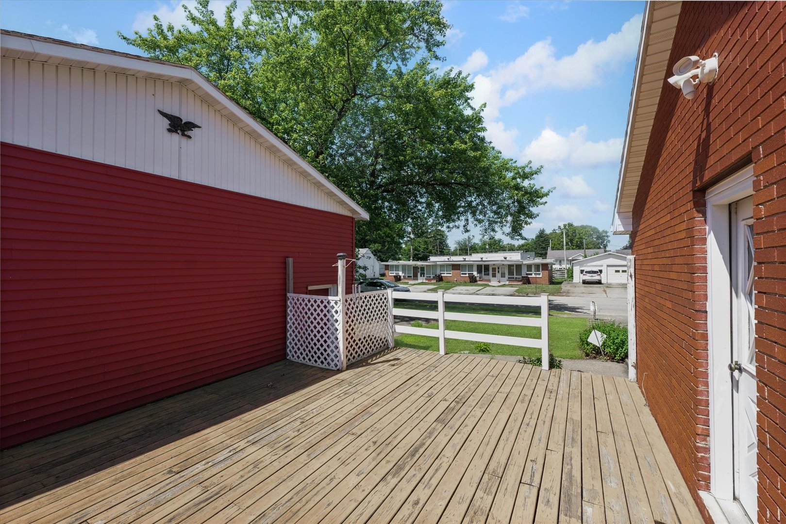 120 North Fredrick Street Rantoul, IL 61866 - Photo 46 of 46 a view of balcony with wooden floor and outdoor seating