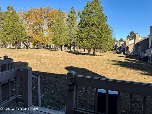 a view of a lake with a yard