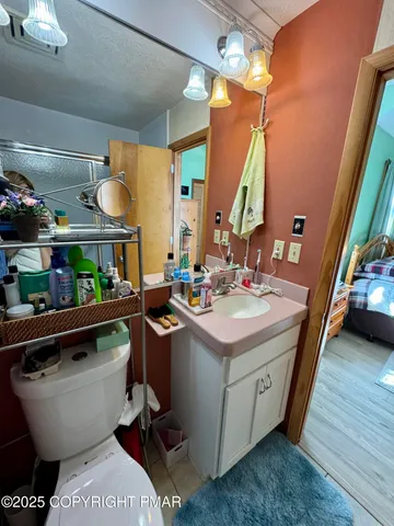 a room with a sink and a stove