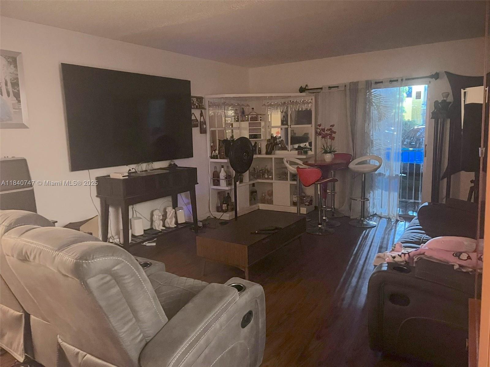 18101 Northwest 68th Avenue, Unit D101 Hialeah, FL 33015 - Photo 1 of 27