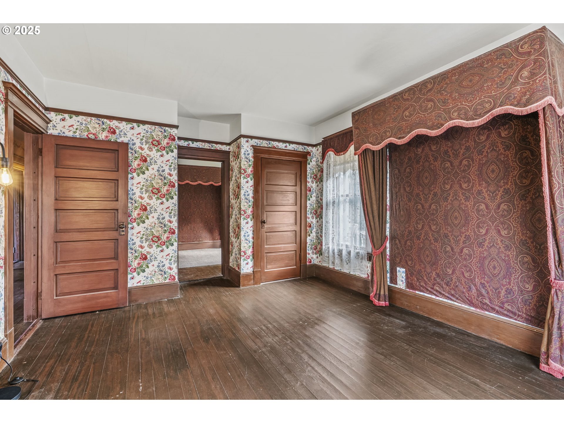 1110 D Street Vader, WA 98593 - Photo 20 of 45 a view of an empty room with wooden floor closet and fire place