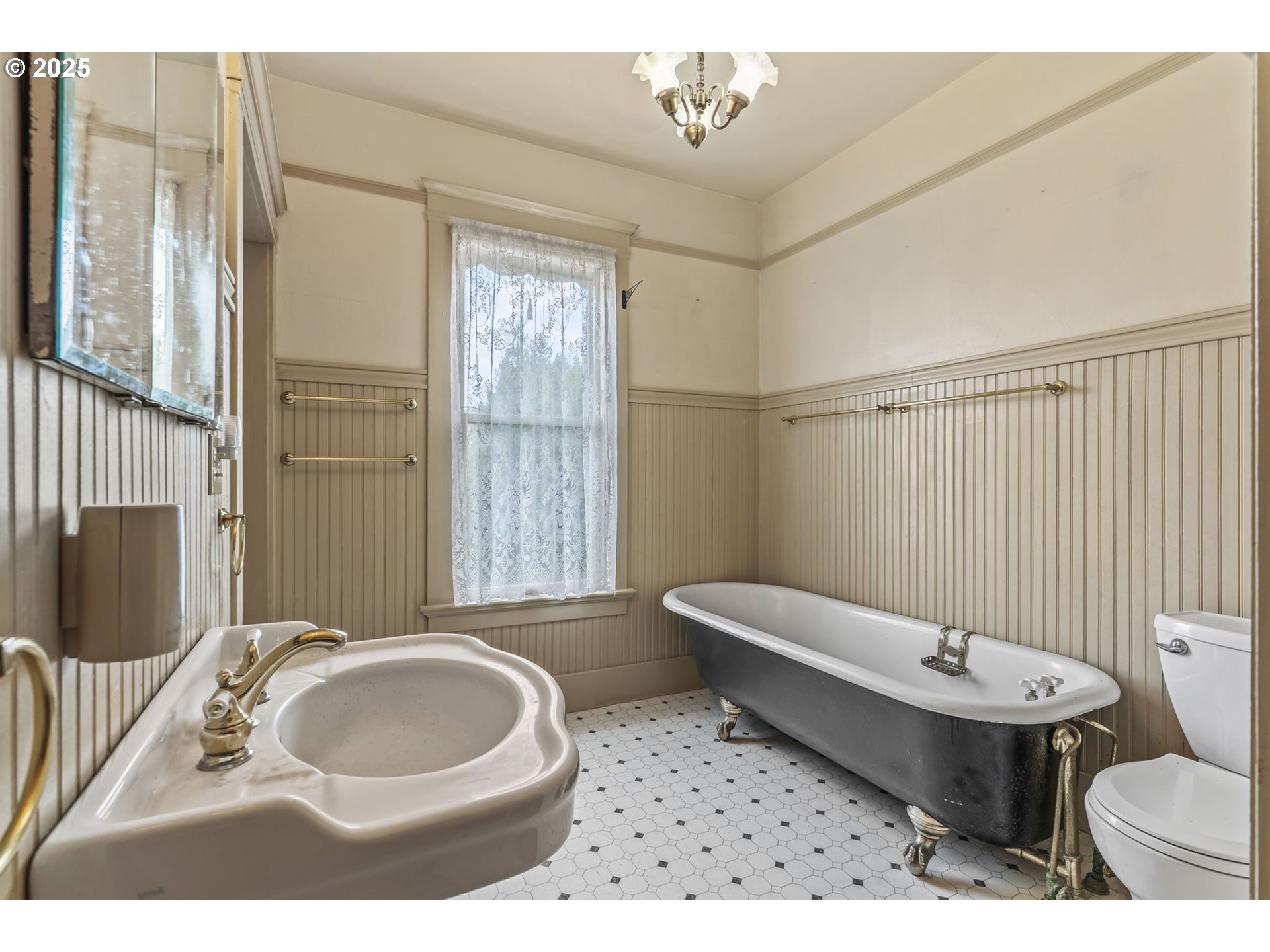 1110 D Street Vader, WA 98593 - Photo 22 of 45 a bathroom with a sink toilet a mirror and tub