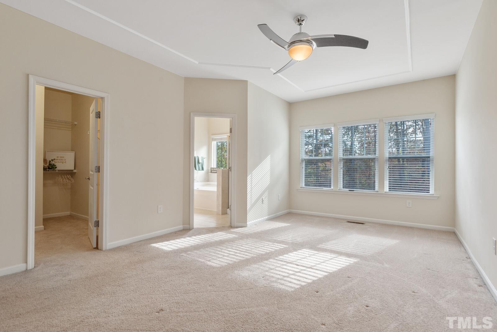 637 Edgewater Ridge Court Apex, NC 27523 - Photo 15 of 31 a view of an empty room with a window