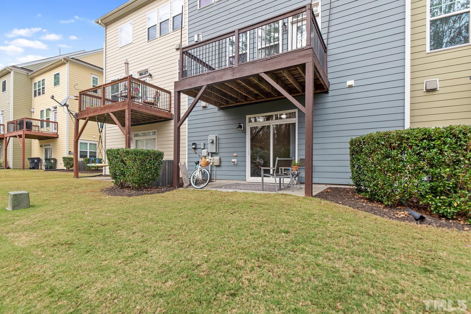637 Edgewater Ridge Court Apex, NC 27523 - Photo 28 of 31 a view of a house with basketball court