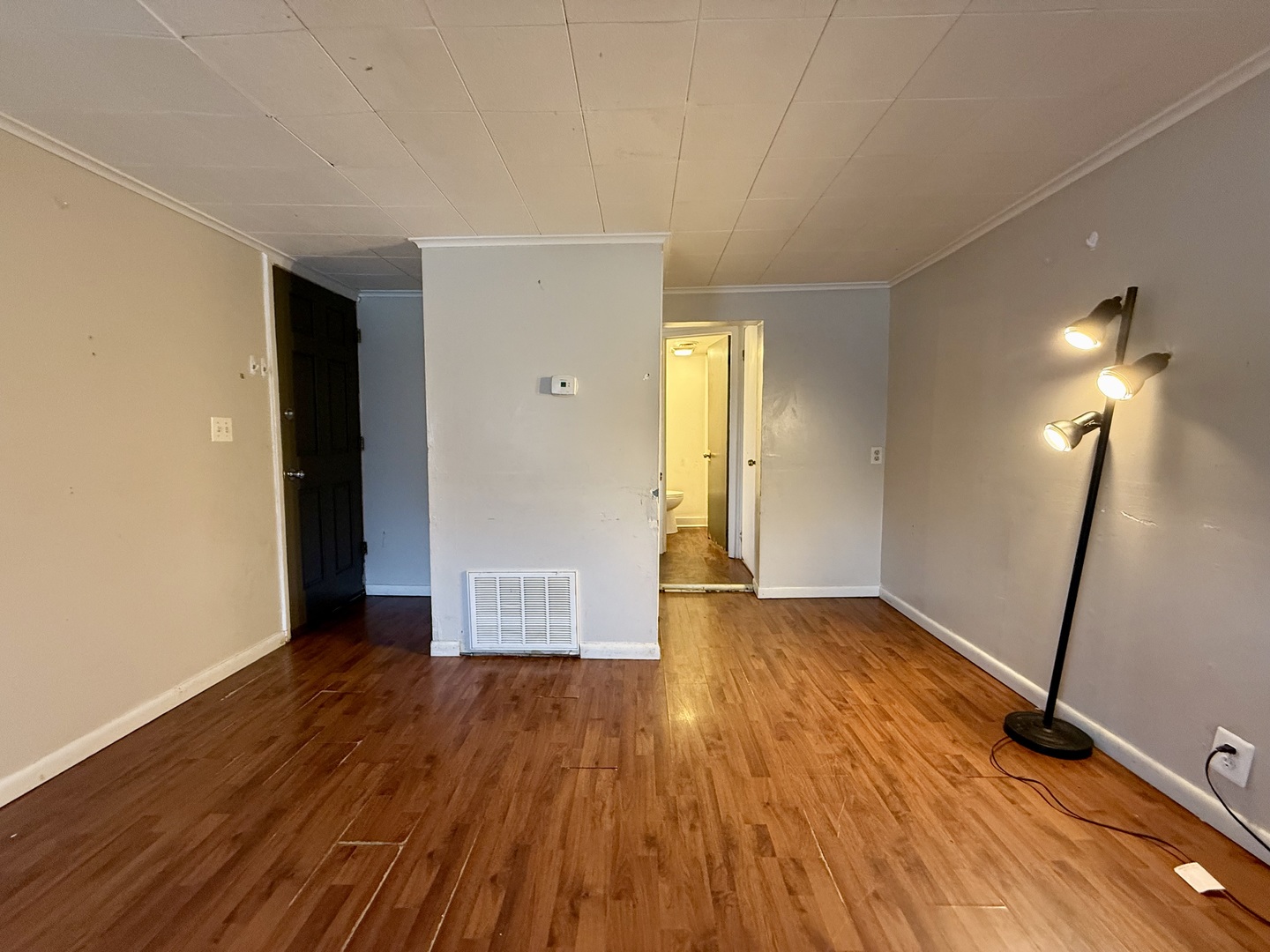 723 Richards Street, Unit 2 Joliet, IL 60433 - Photo 5 of 13 a view of empty room with wooden floor