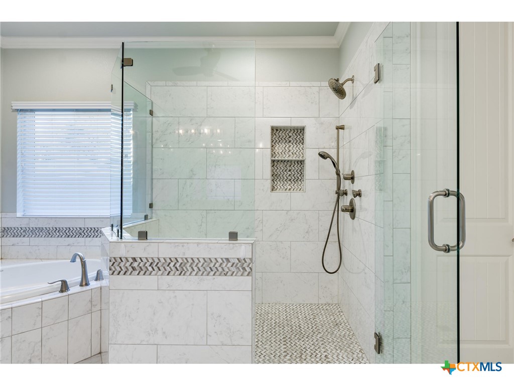 1729 Las Lomas Court Temple, TX 76502 - Photo 14 of 43 Primary walk-in shower with frameless glass