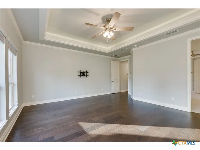 a view of kitchen with stainless steel appliances kitchen island sink stove and refrigerator
