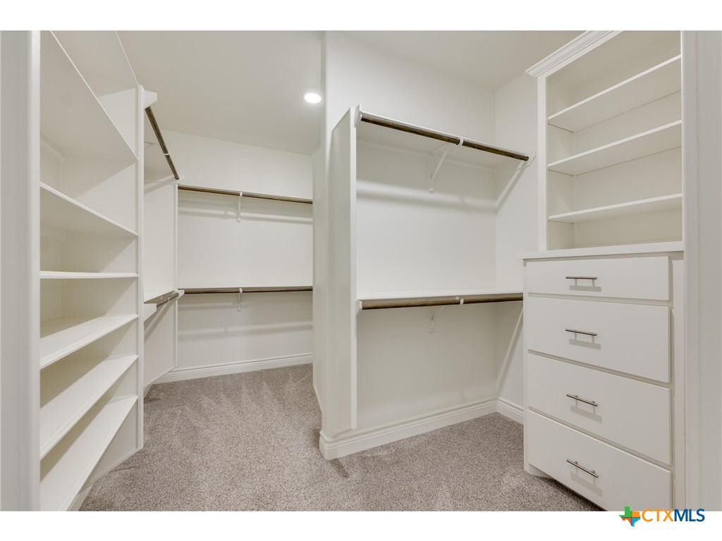 1729 Las Lomas Court Temple, TX 76502 - Photo 16 of 43 Expansive walk-in closet with custom built-ins