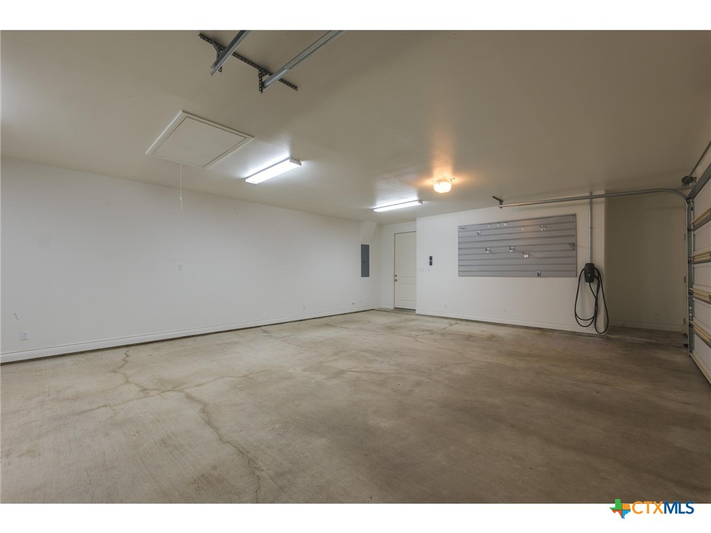 1729 Las Lomas Court Temple, TX 76502 - Photo 31 of 43 Oversized 3-car garage room for storage and hobbies